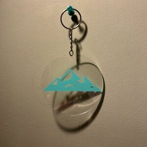 Clear Keychain with Teal Mountain Design